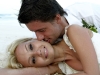 bride-groom-beach-kissing-wedding