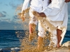 bride-groom-kicking-barbados-beach-sand